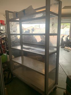 Storage garage shelves with plexiglass on 3 sides