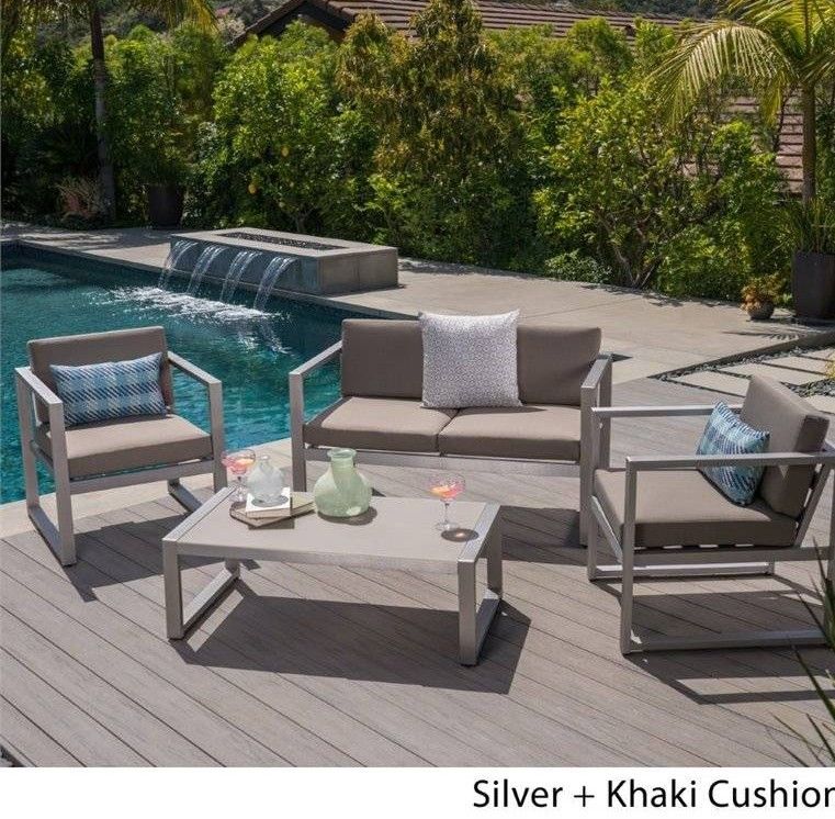 Outdoor patio sofa with chairs and coffee table 