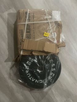 Two 35 LB Olympic Weight Plate