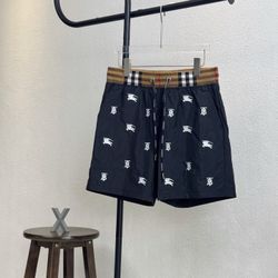Burberry logo pattern beach shorts with inner drawstring