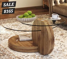 Coffee table with wood and glass  for $165