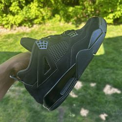 black cat jordan 4s