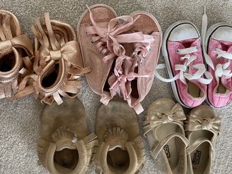 five pairs size five baby shoes