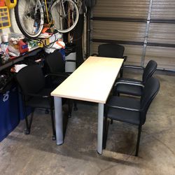 Table And 5 Black Stackable Chairs 