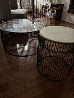Crate and barrel round coffee/end table set glass top and marble top black metal