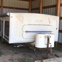 Hi-Lo  Fun chaser Camper 21’.  1985