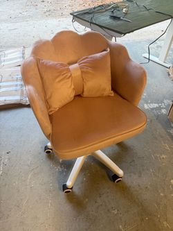 Pink velvet accent chair with bow pillow swivel and height adjustable chair