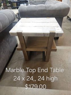 Marble Top End Table with Wood Base We are located at 2811 East Bell road. Another Time Around Furniture.