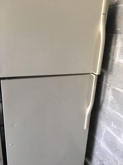 Kenmore beige refrigerator