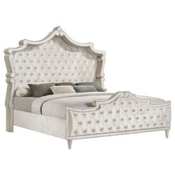 Upholstered bed with ivory velvet