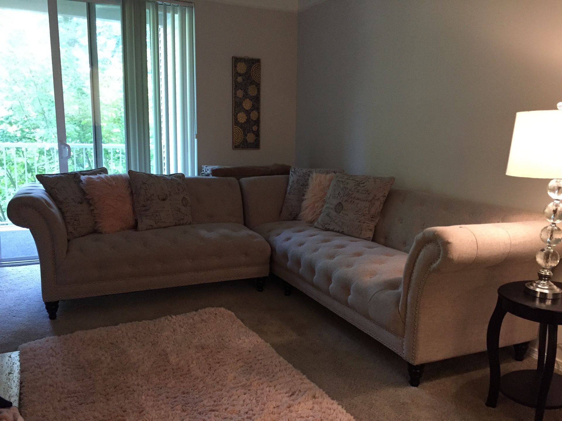 Beige tufted couch