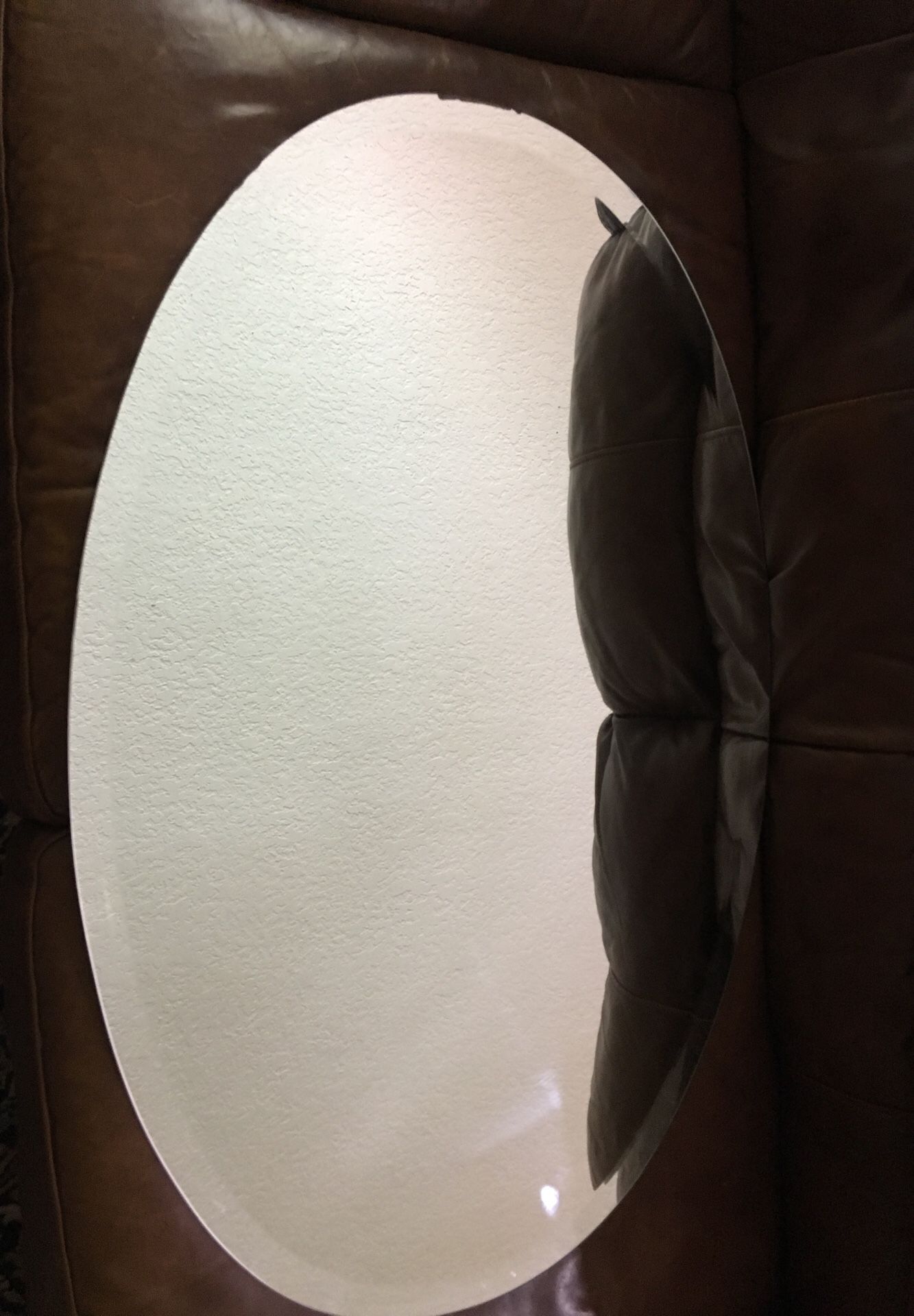 Oval shaped bathroom mirror