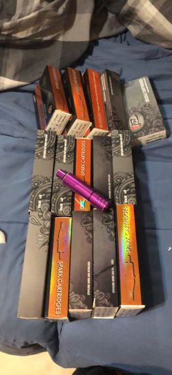 Hawk pen tattoo machine and 15 boxes of needles