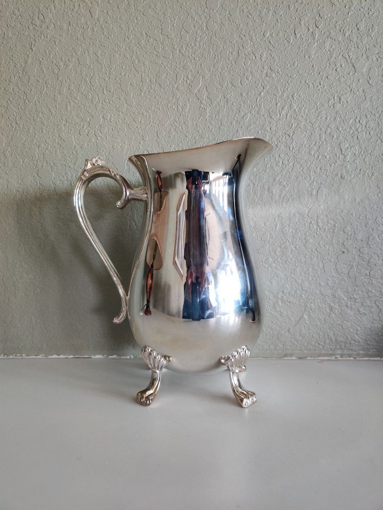 Antique pewter metal pitcher