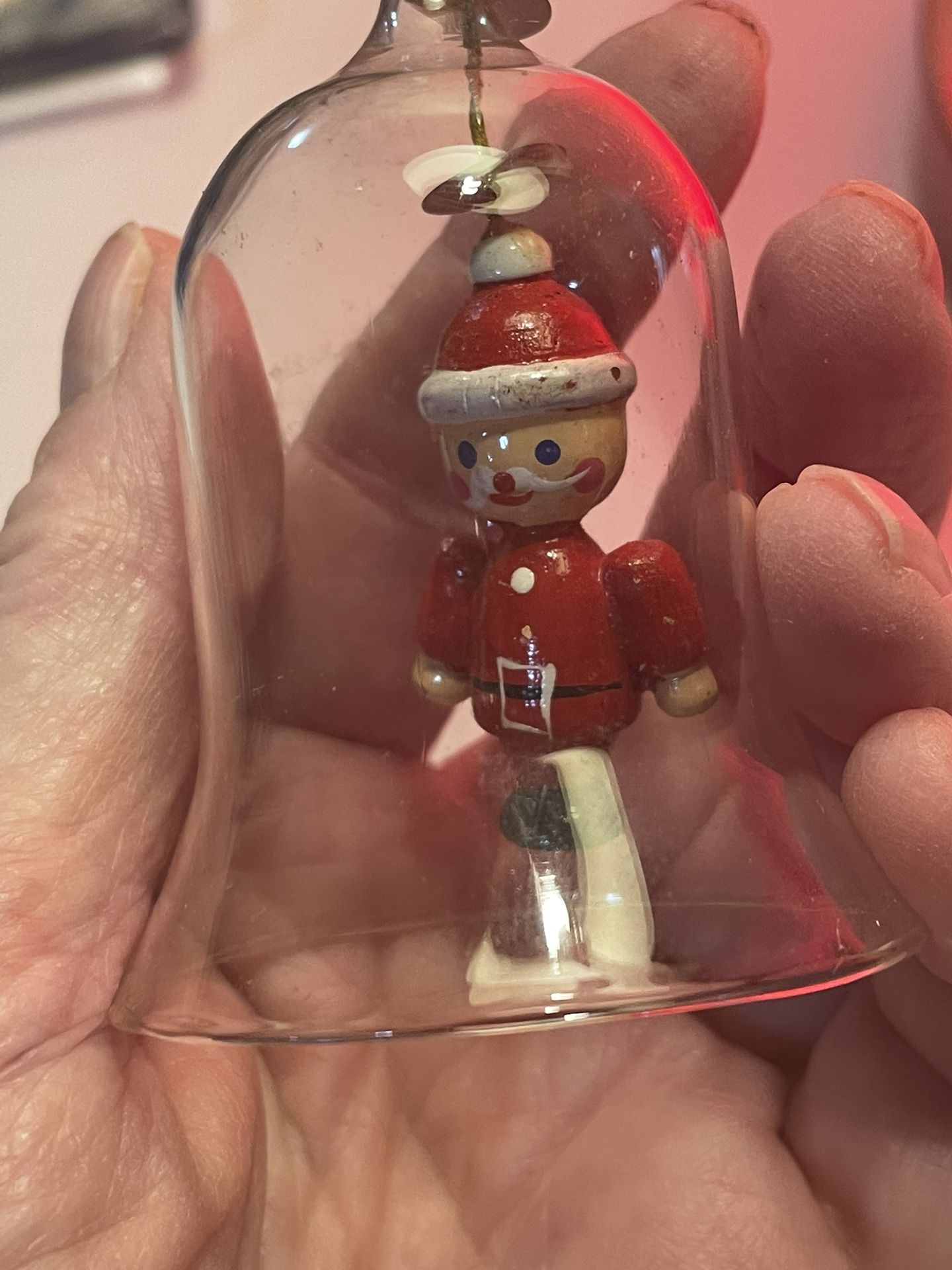Vtg Clear Glass Bell Ornament with Figurine Of Santa soldier. 2 1/2 Inch.