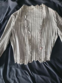 fancy embroidered blazer or sweater or cardigan or something