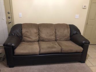 Black and brown couches