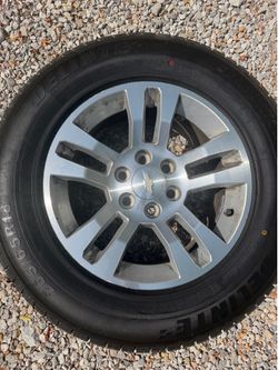 Set of 4 Chevy O.E.M. Wheels and tires