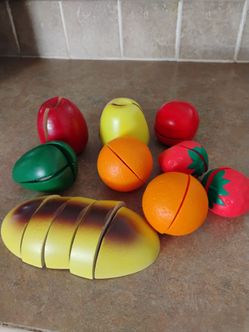Lot of 9 Pc Cut and Play Food - Fruits 
Some are wood and some are Plastic