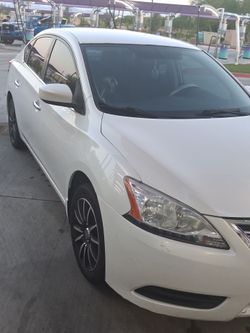 Nissan Sentra White 4-Door Sedan