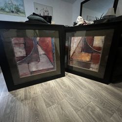 Set up two framed abstract art