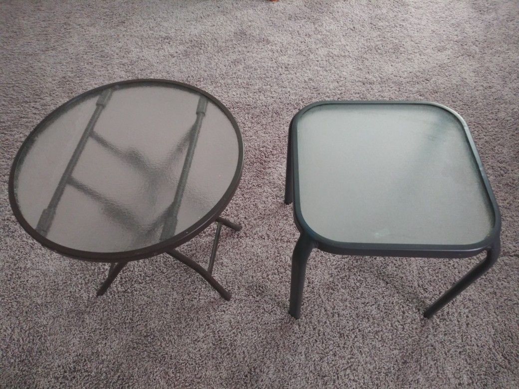 Two small glass tables