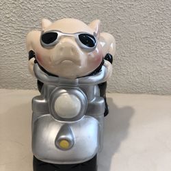 Pig Riding Motorcycle Ceramic Cookie Jar Approximately 9.50” Tall And 11” Wide  No chips or cracks, If you see it here , it is available. Like new
