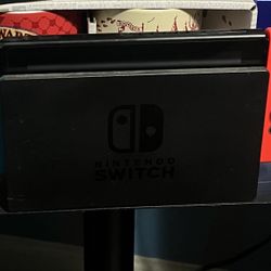 Nintendo Switch with Neon Blue and Neon Red Joy‑Con