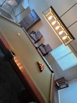 Pool table, chairs, table top, and cues