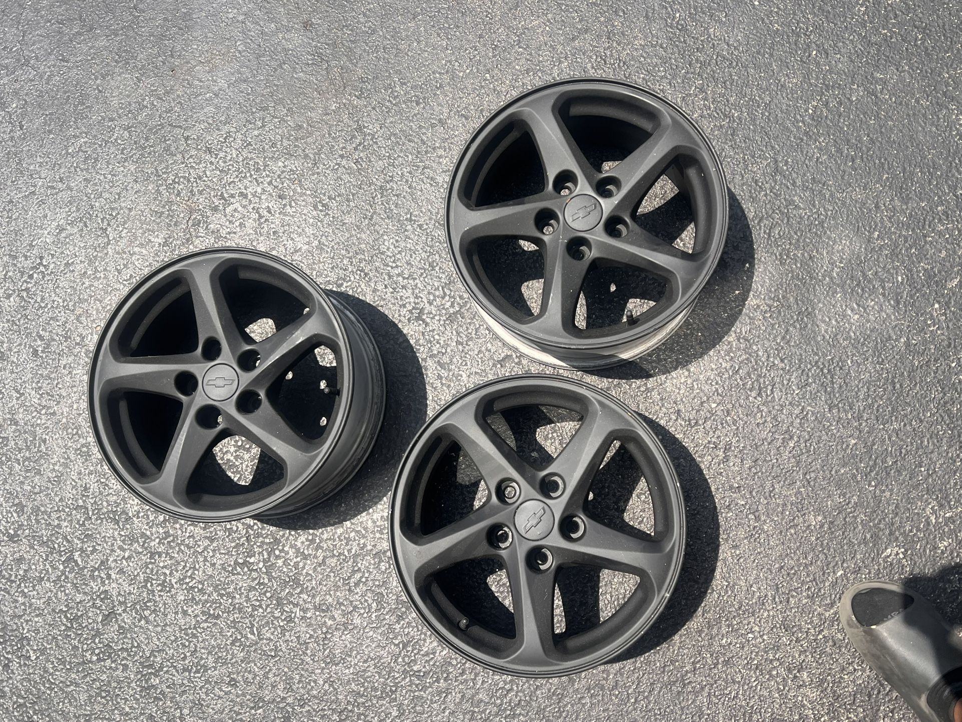 3 black alloy rims