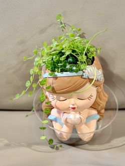 String of Turtles in Beautiful Ceramic Girl Planter