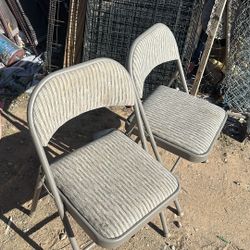 Two Folding Metal Chairs