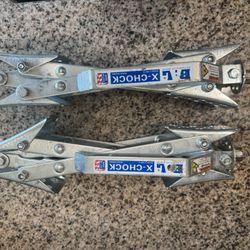 28010 X-Chock Tire Locking Chock – Wheel Stabilizer for Tandem Axle Trailers & RVs – Easy Ratchet Operation, Heavy-Duty Steel Construction