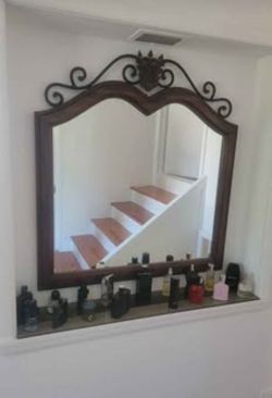 Beautiful wood and wrought iron Drexel mirror. 39 x 42H