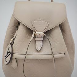 LV Montsouris NM backpack - beige exterior/pink interior