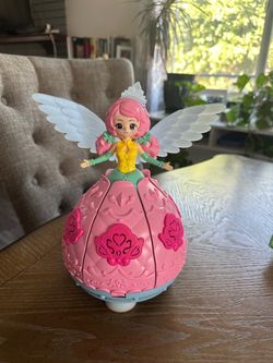 Singing, spinning, light-up fairy