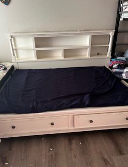 Queen bed frame from Ashley’s furniture store