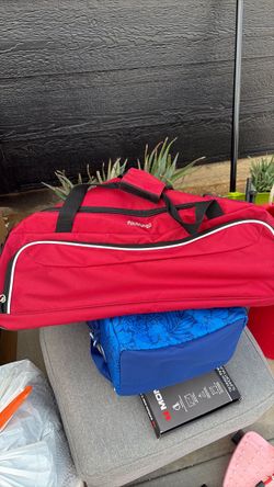 Red rolling duffel bag