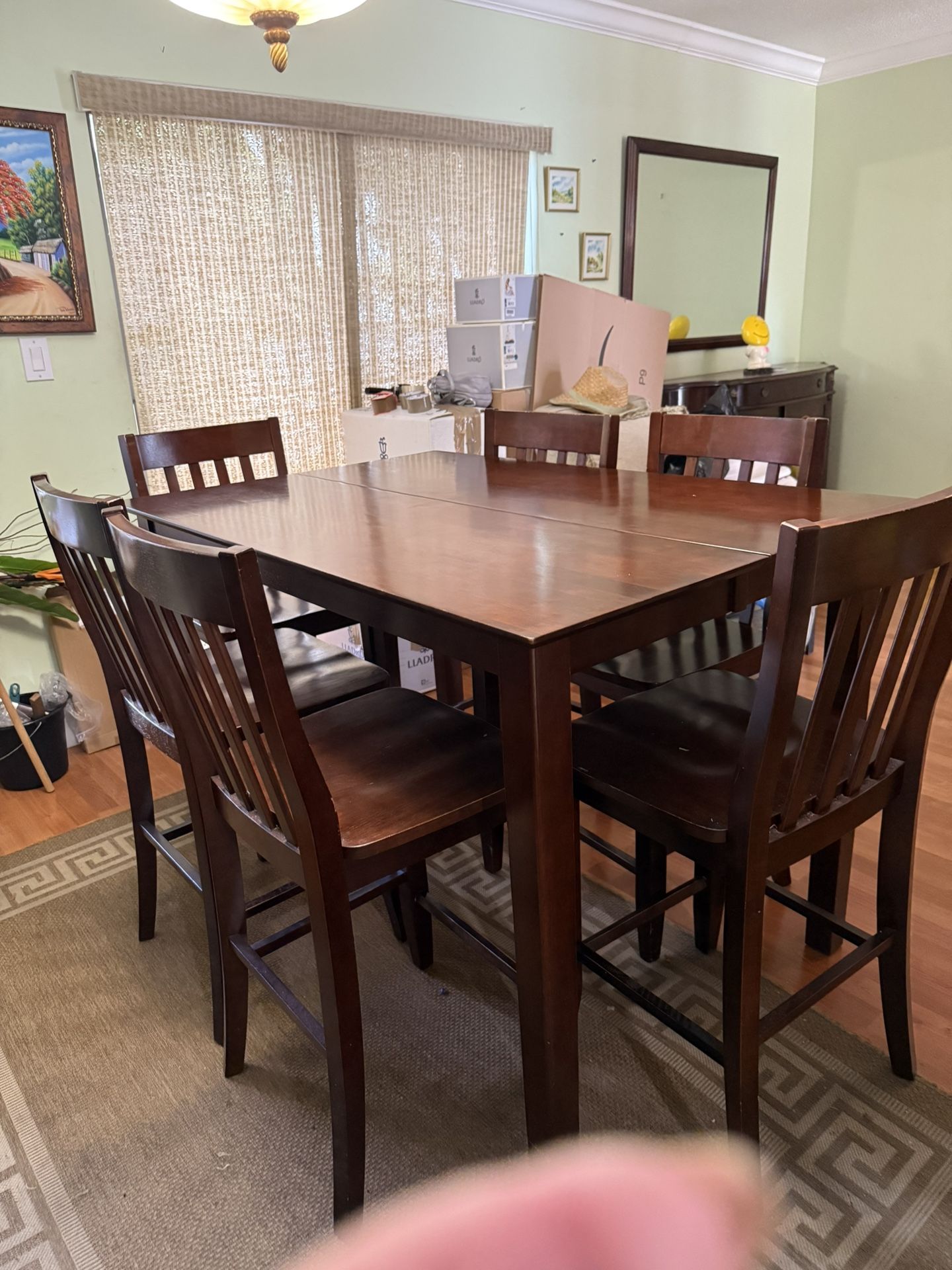 Wood. In really great condition, Dining Table and six chairs.
