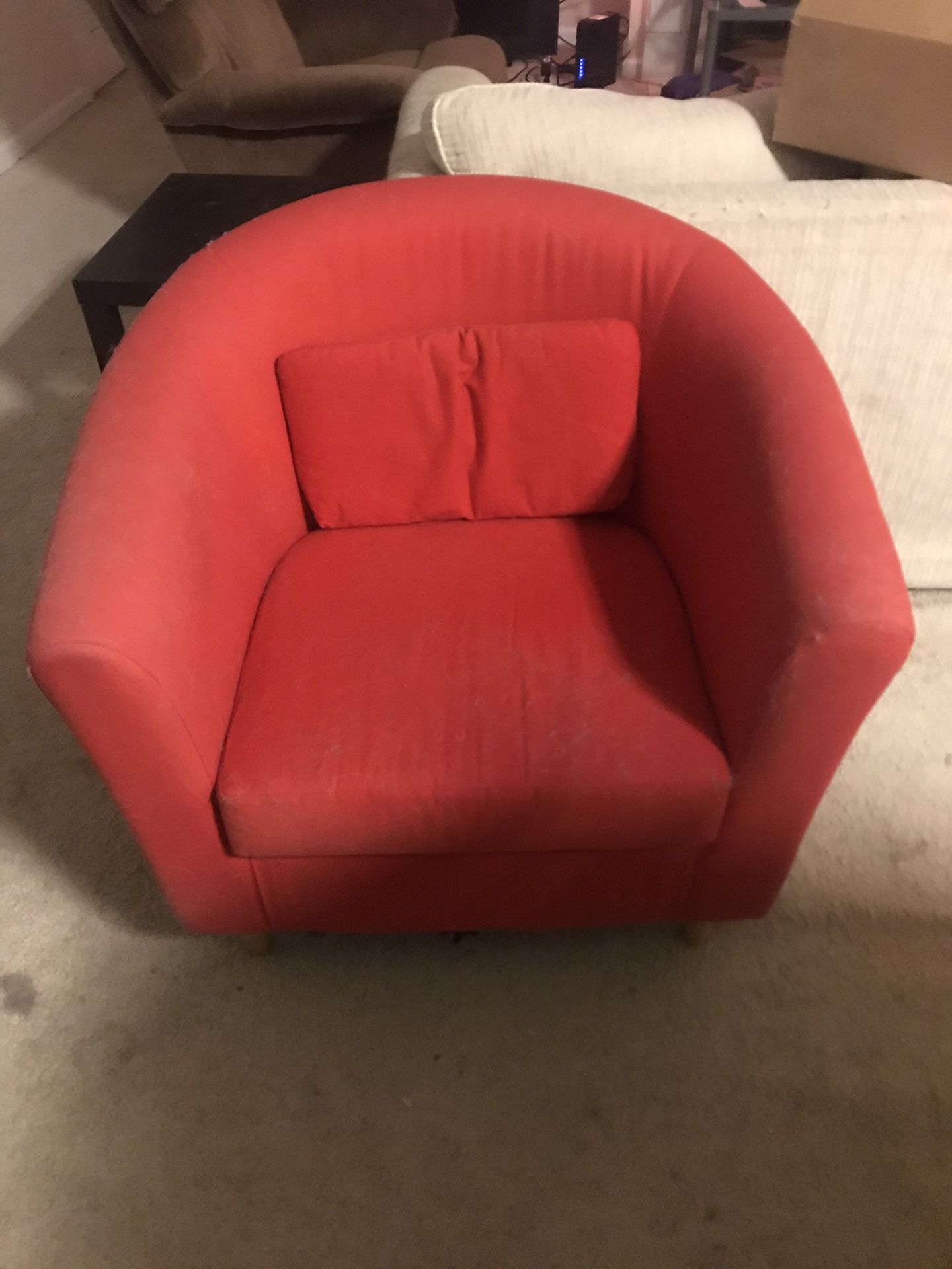 Two red accent chairs