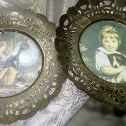 two (2) antique Brass ornate frames/wall hangs. with print portraits