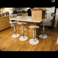 4 Backless Swivel Chairs