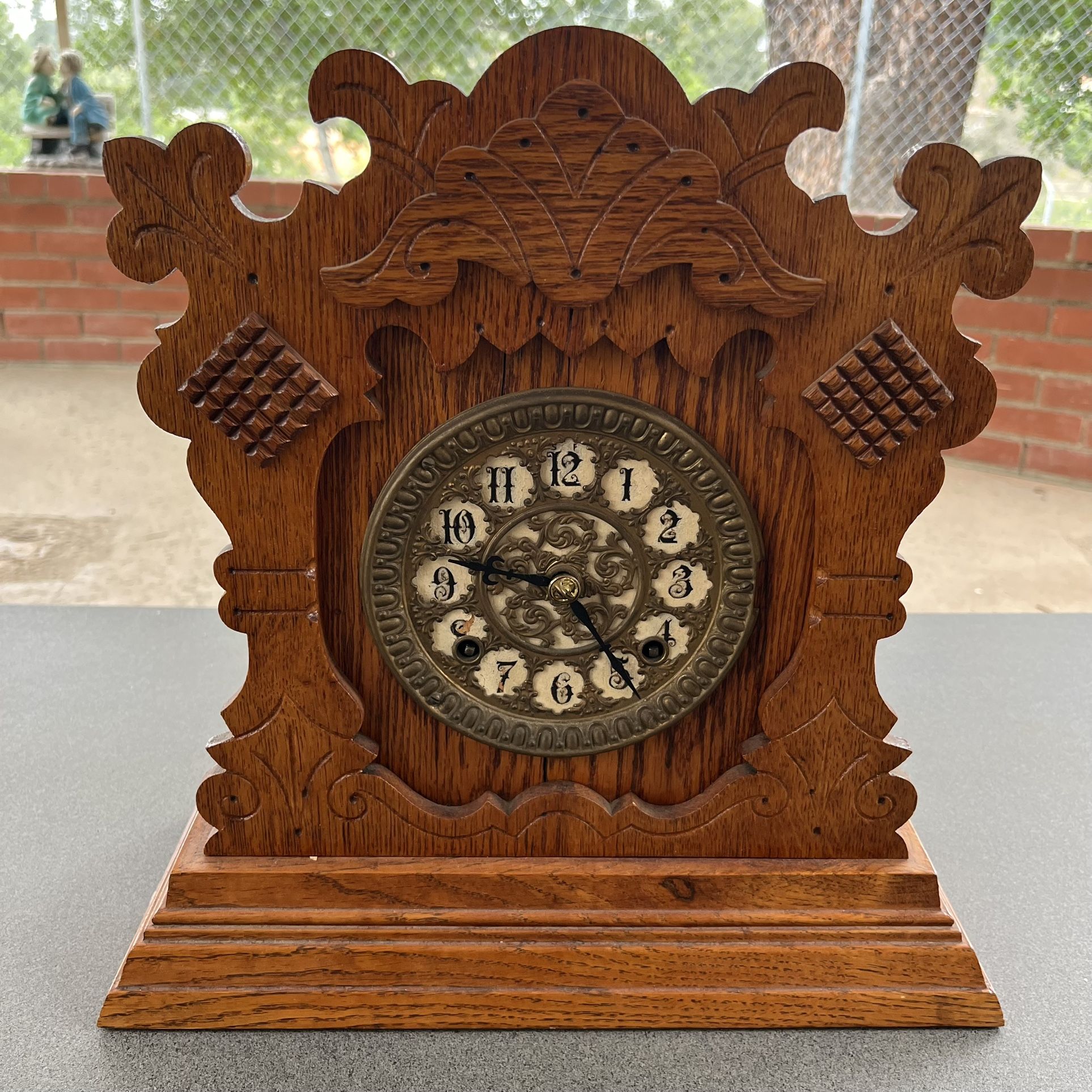 1878 Antique Ansonia mantel mechanical clock in oak cabinet, 8 day Peak strike