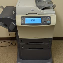 HP Laser Jet 4345MFP with Roller Cabinet 