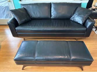 Gino Sofa 85” on Jacobean Base Upholstered in Samba Ebony Leather with Ottoman by Biltwell ($1,900 sofa; $500 ottoman)