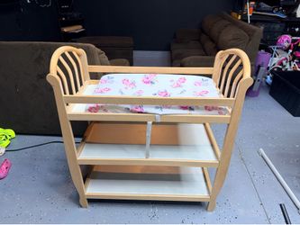 Woden changing table with changing pad