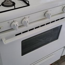 Frigidaire Glass Front Stove And Frigidaire Refrigerator 