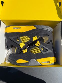 Jordan 4s Thunder black and yellow size 9