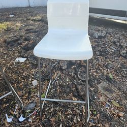 2 white bar chairs