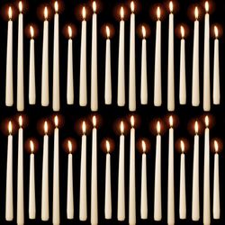 63 new ivory taper candles